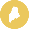 A decorative graphic. It is a yellow circle which has a white silhouette of Maine in the middle.