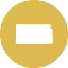 A decorative graphic. It is a yellow circle which has a white silhouette of Kansas in the middle.
